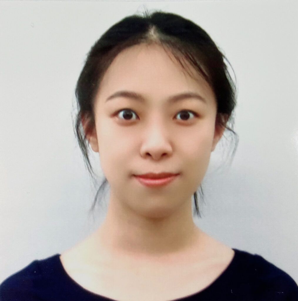 Headshot of Dr. Qingli Lei in black shirt against a white background